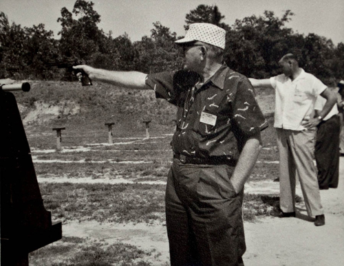 1940s Pistol match, man shooting revolver