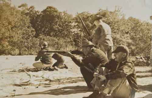 1950s club members shooting rifles