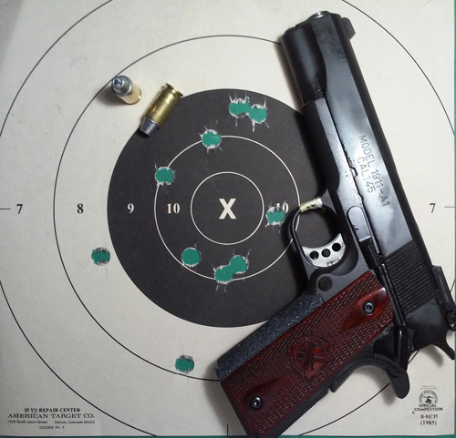 pistol target with decent group and 1911 type pistol