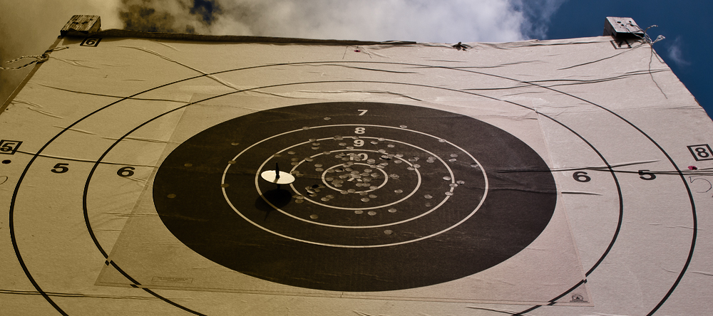 looking up at 600 yard rifle target from pit with scoring disk