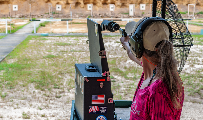 female shooting precision pistol with a 1911 style pistol