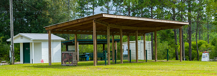 trap range with five stations that is under a wood shelter